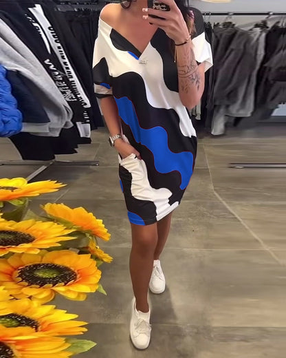 Penelope - Elegante V-halsjurk met golvende print