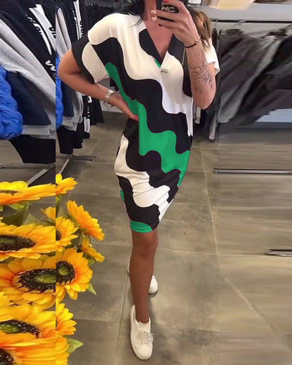 Penelope - Elegante V-halsjurk met golvende print