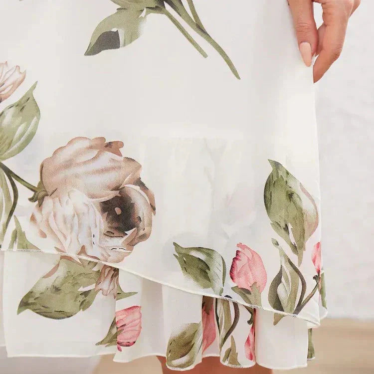 👗Rode chiffonjurk met bloemblaadjes