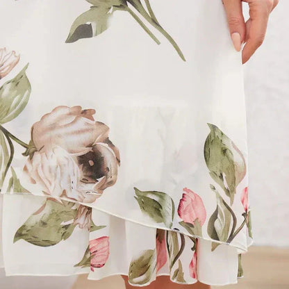 👗Rode chiffonjurk met bloemblaadjes